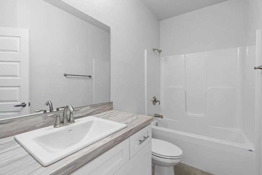 Representative furnished interior of a home built from the Plan 1478 by Adams Homes in Rolling Hills, Bell (Image 8). Representative furnished interior of a home built from the Plan 1478 by Adams Homes in Rolling Hills, Bell (Image 8).