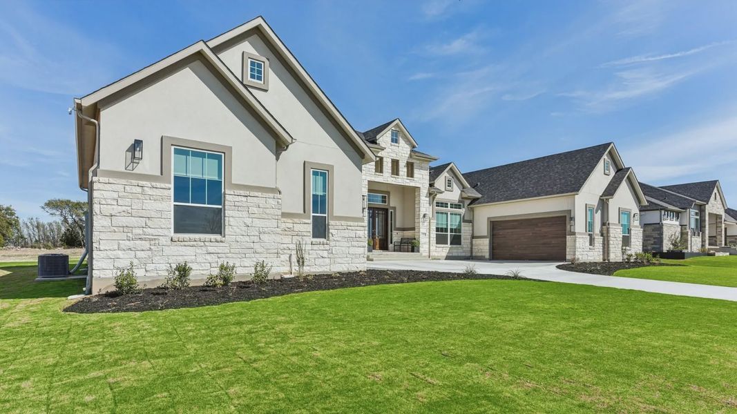 Representative exterior photo of a completed home built from the Garet by Chesmar Homes in Feathergrass, Florence, TX (Image 26).