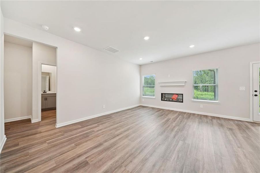 Spacious, unfurnished interior of a new home in Vines at Mill Creek - Estate Series, Braselton (Image 13).