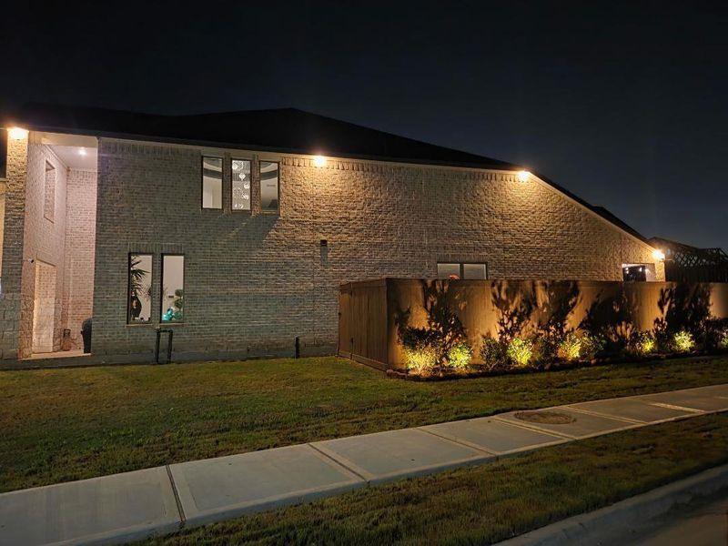 Exterior details and patio area of a home in The Trails, New Caney (Image 32).