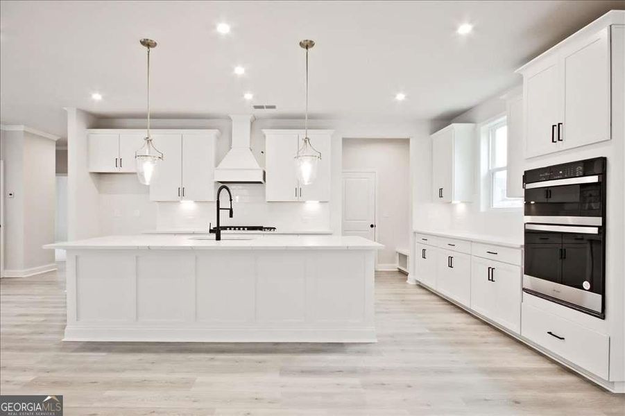 Furnished interior view inside a new home in The Paddocks at Doc Hughes, Buford (Image 16).