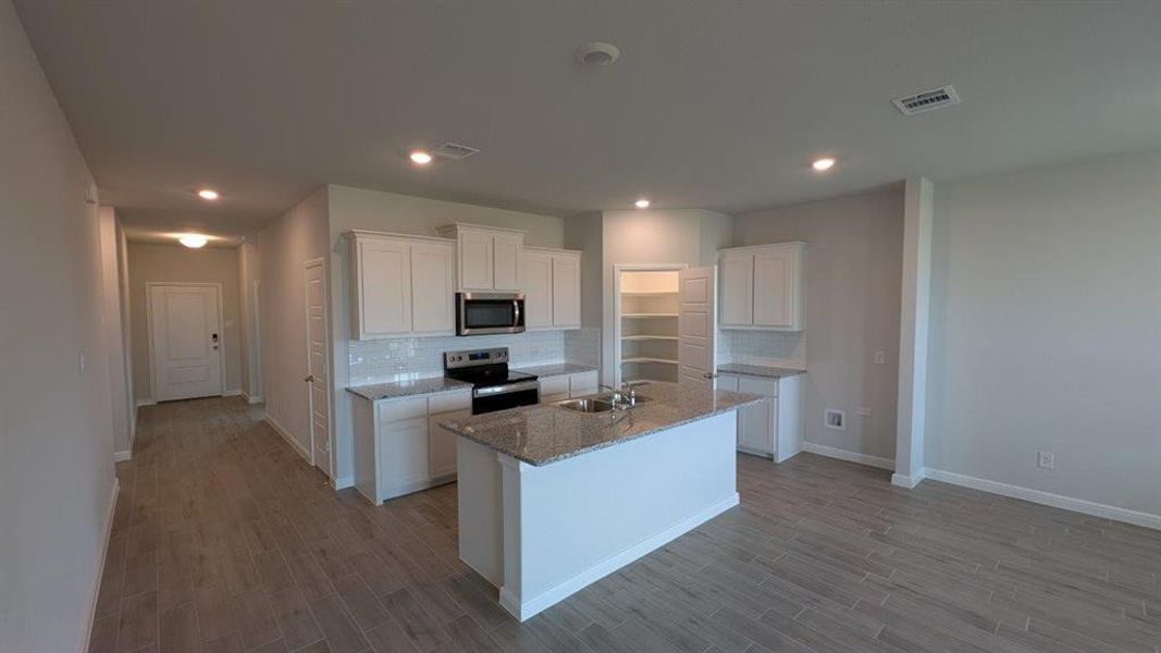 Kitchen - All Home and community information, including pricing, included features, terms, availability and amenities, are subject to change at any time without notice or obligation. All Drawings, pictures, photographs, video, square footages, floor plans, elevations, features, colors and sizes are approximate for illustration purposes only and will vary from the homes as built.