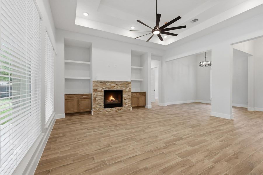 Don't miss the double tray ceiling with recessed lighting, and an extra large fan!