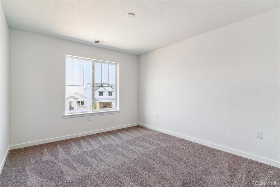 Spacious, unfurnished interior of a new home in Harvest Crossing, Aurora (Image 17).