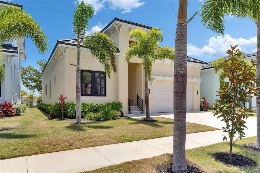 Front exterior of a new home in , Apollo Beach, FL, highlighting curb appeal (Image 26).