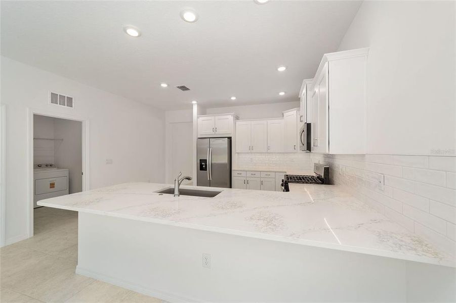 Furnished interior view inside a new home in Calesa Township, Ocala (Image 6).