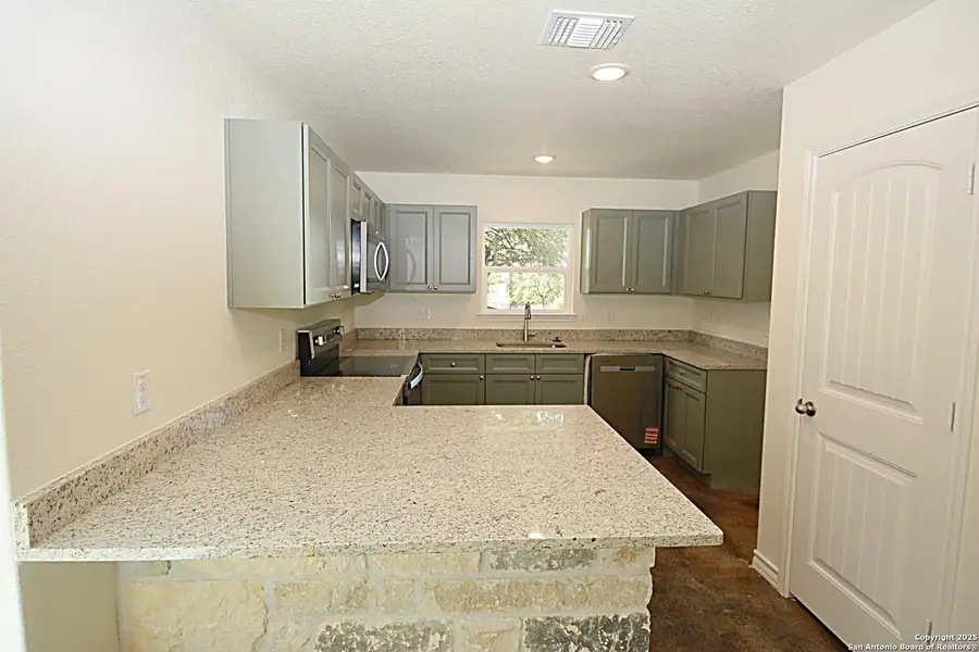 Furnished interior view inside a new home in , Spring Branch (Image 2).