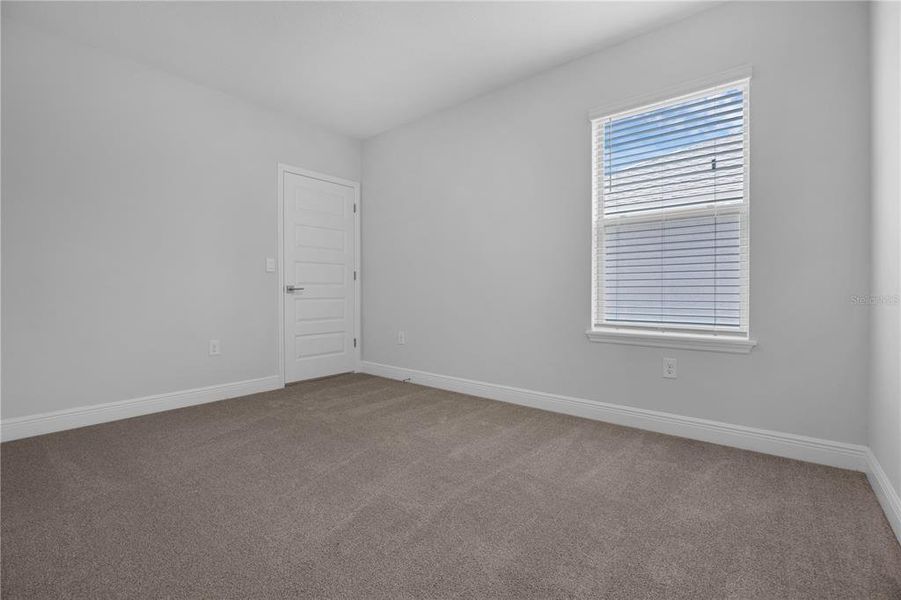 Spacious, unfurnished interior of a new home in Waterleigh, Winter Garden (Image 35).