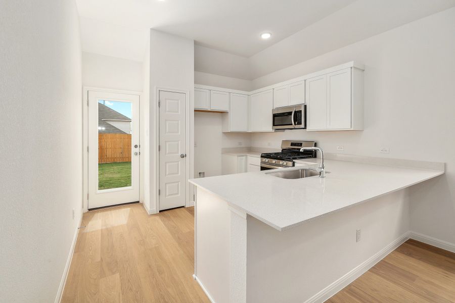 Furnished interior view inside a new home in Trinity Ranch, Elgin (Image 6).