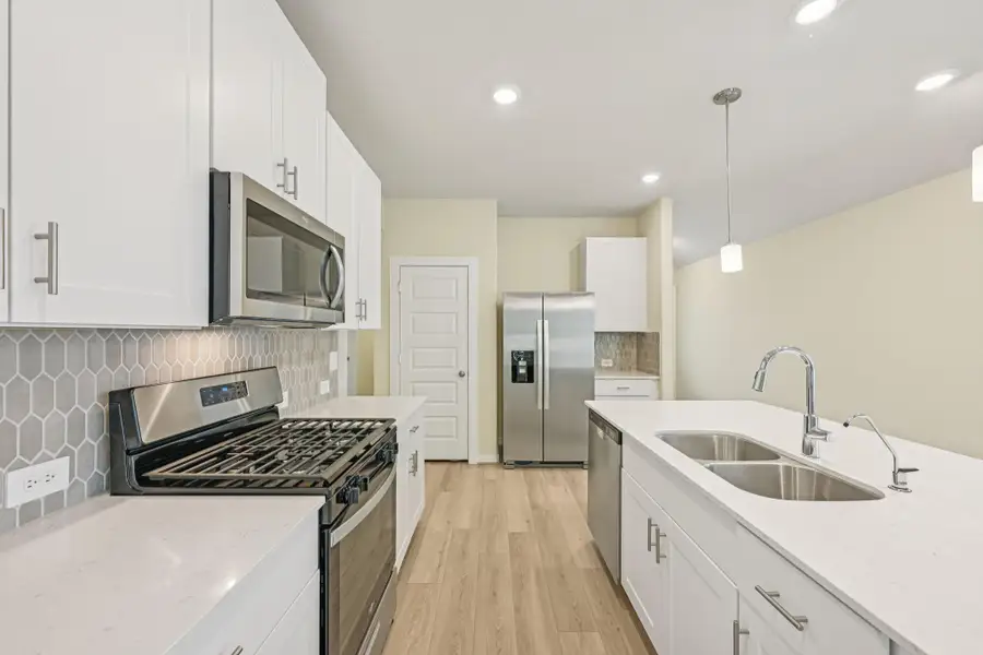 Photo is not of the actual home, but is an inspirational photo of builder’s model home and may depict options, furnishings, and/or decorator features that are not included