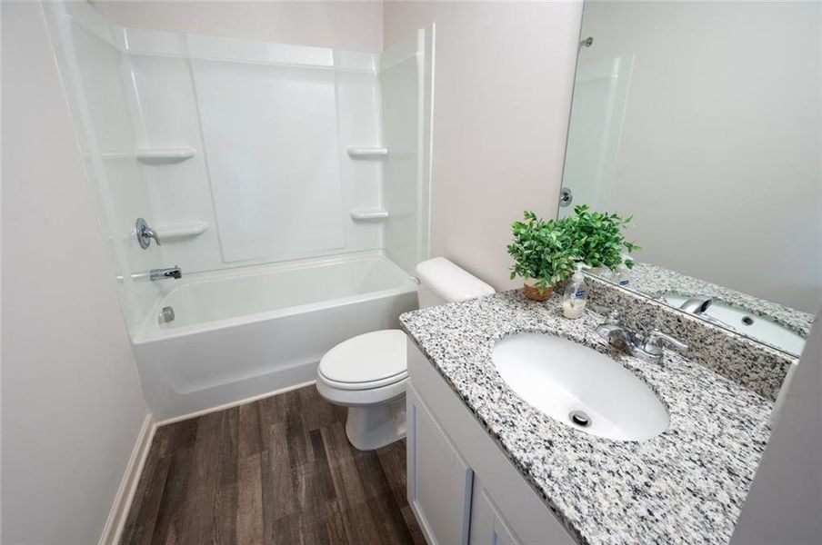 Furnished interior view inside a new home in , Macon (Image 13).