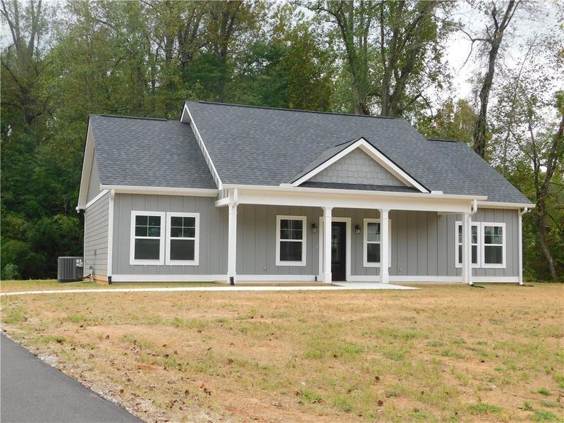 Front exterior of a new home in , Dahlonega, GA, highlighting curb appeal (Image 2).