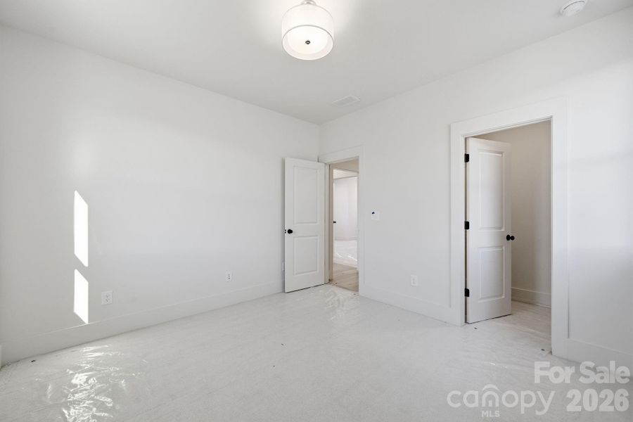 Spacious, unfurnished interior of a new home in The River District, Charlotte (Image 12).