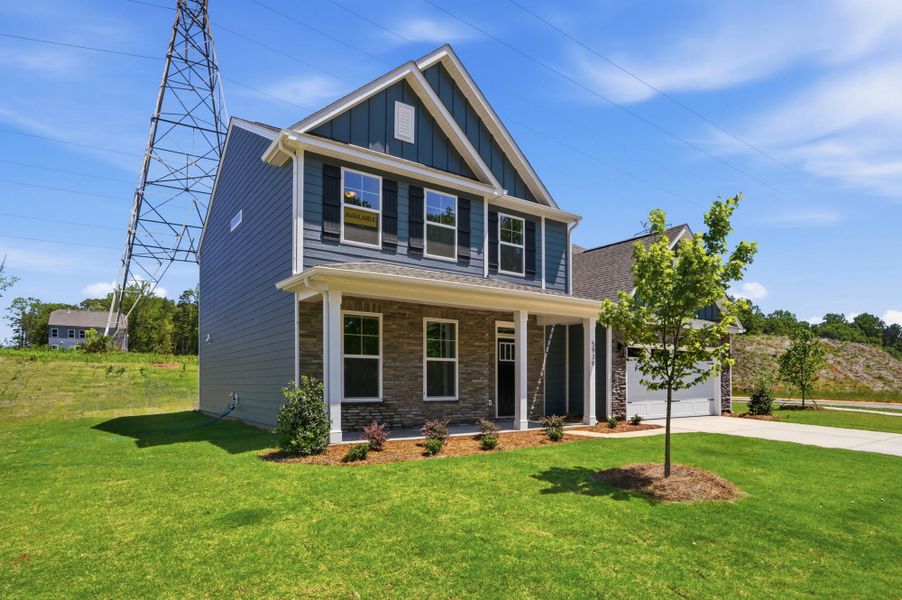 Front exterior of a new home in Enclave at Riverdale, Huntersville, NC, highlighting curb appeal (Image 2).