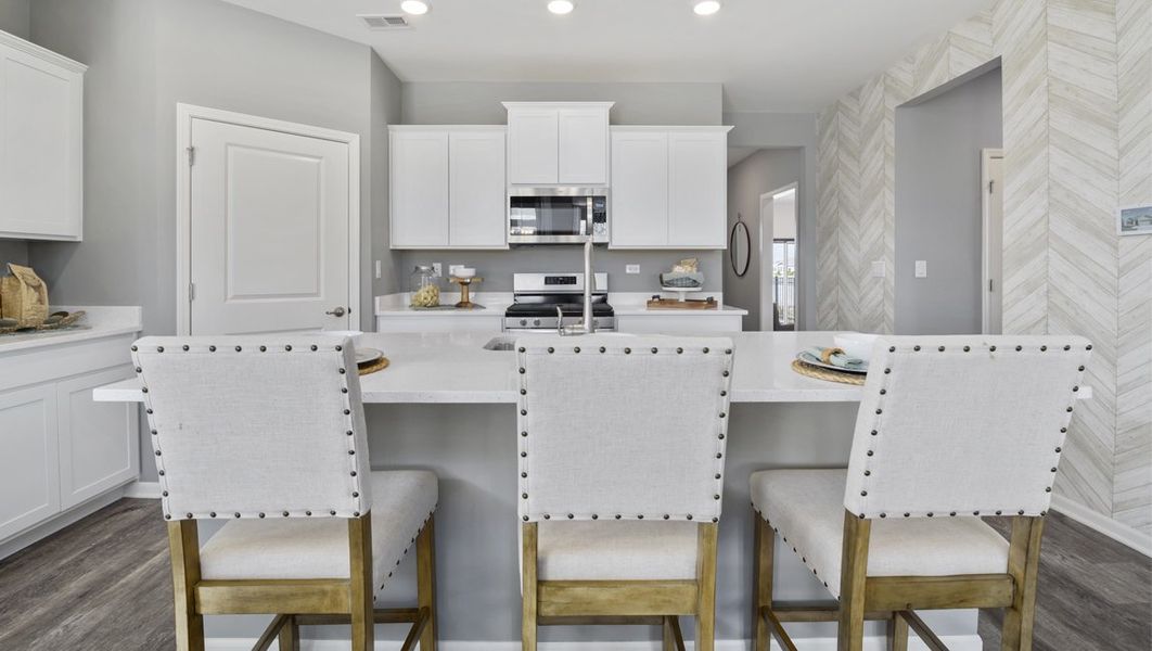 Representative furnished interior of a home built from the Arlington by D.R. Horton in Legacy Farms, White House (Image 5).