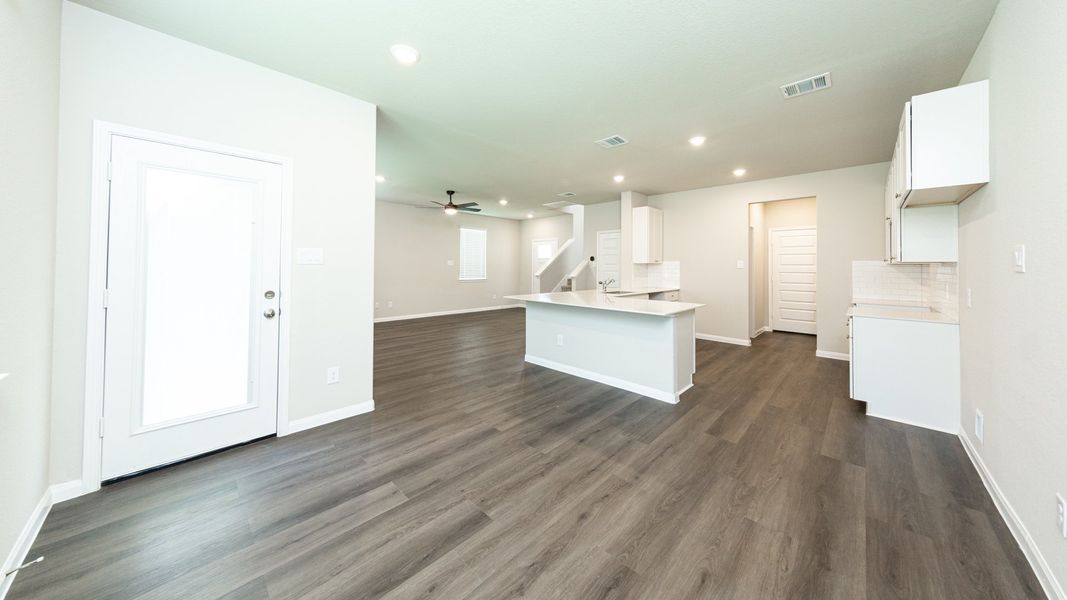 Dining Area to Kitchen and Family Room Dining Area to Kitchen and Family Room