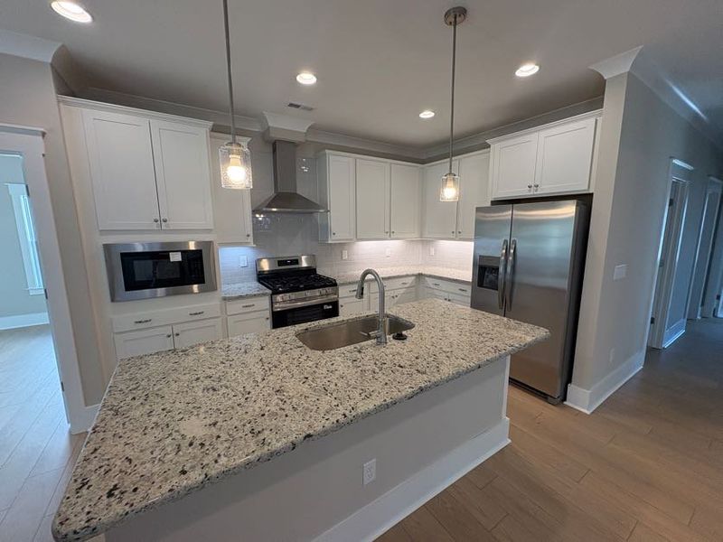 Furnished interior view inside a new home in Riverside Cove, Wilmington (Image 11). Furnished interior view inside a new home in Riverside Cove, Wilmington (Image 11).