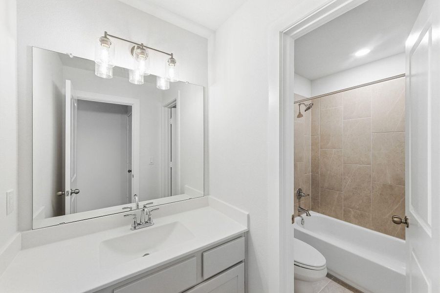 Furnished interior view inside a new home in The Colony, Bastrop (Image 17).