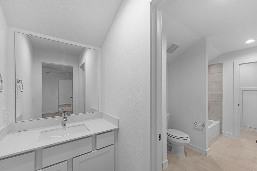 Furnished interior view inside a new home in Grand Mason Crossing, Katy (Image 9).