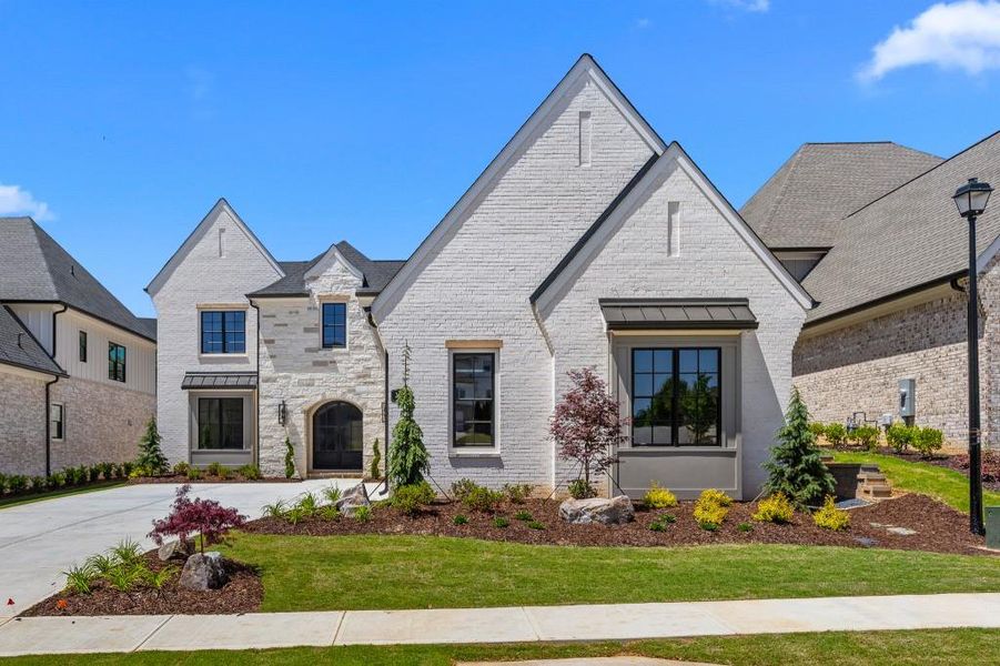 Front exterior of a new home in , Braselton, GA, highlighting curb appeal (Image 27).