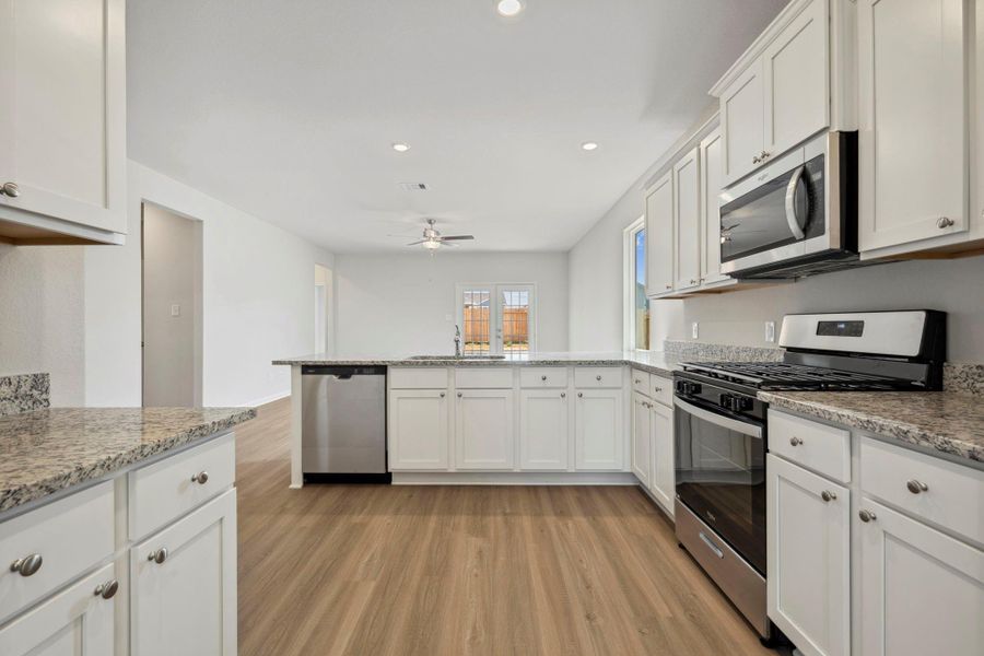 Furnished interior in a model home at Trails at Cochran Ranch in Waller (Image 11).