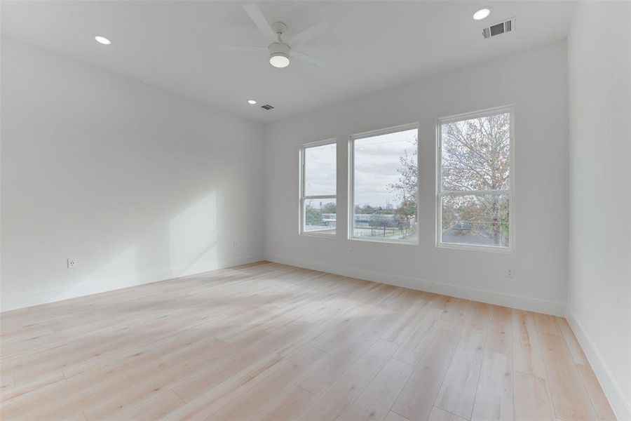 Abundant natural lighting in the primary bedroom