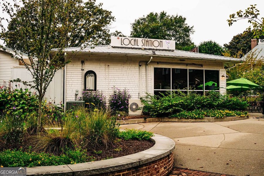 Front exterior of a new home in Rosewood Lake Estates, Hoschton, GA, highlighting curb appeal (Image 33).