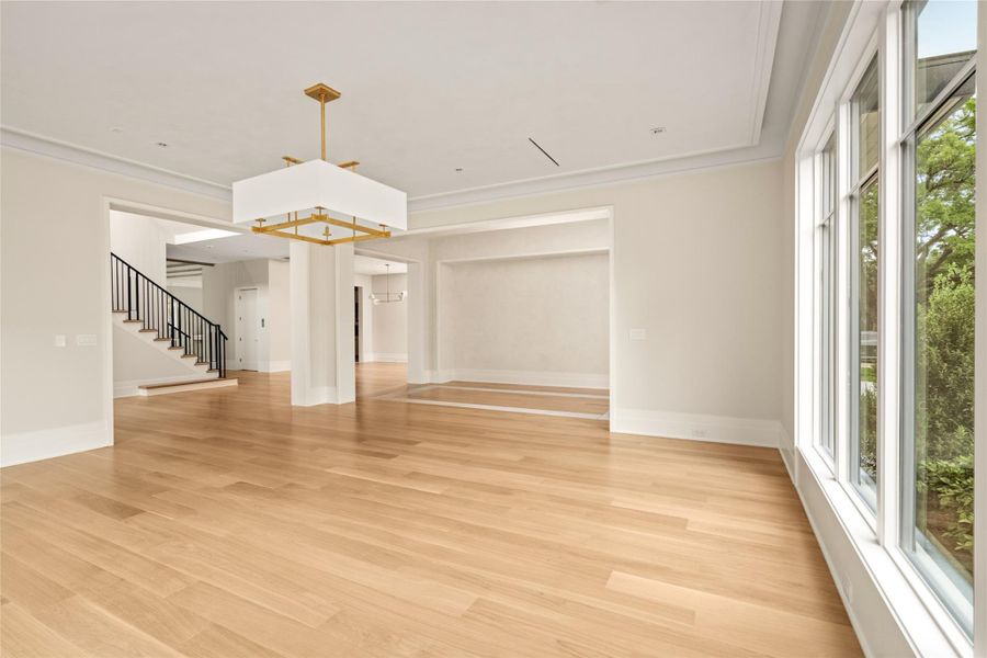 Thoughtfully designed for both everyday living and entertaining, the space opens effortlessly to surrounding rooms with a refined, airy feel.