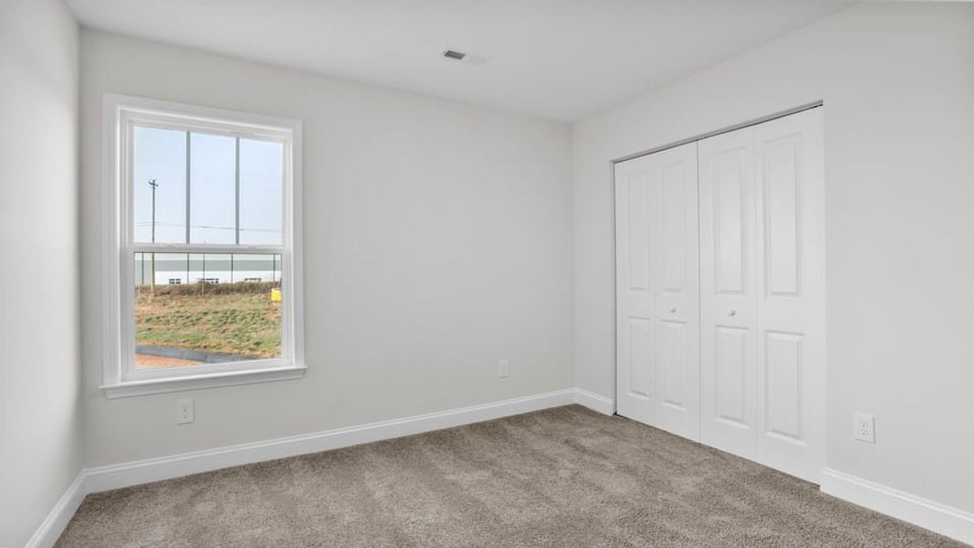 Spacious, unfurnished interior of a new home in Edgewood Estates, Greenville (Image 27).