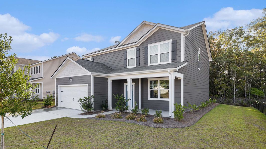 Representative exterior photo of a completed home built from the Plan by D.R. Horton in Hemingway Landing, Conway, SC (Image 16). Representative exterior photo of a completed home built from the Plan by D.R. Horton in Hemingway Landing, Conway, SC (Image 16).