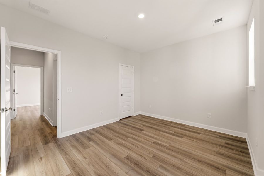 Spacious, unfurnished interior of a new home in Cottages at Lake Emory, Inman (Image 23). Spacious, unfurnished interior of a new home in Cottages at Lake Emory, Inman (Image 23).