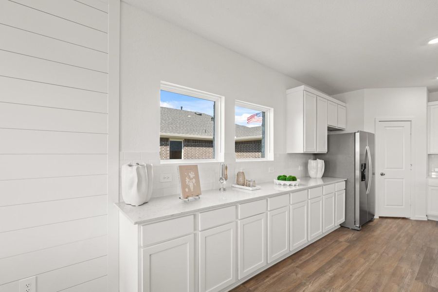 Furnished interior view inside a new home in Newport Pointe, Crosby (Image 9).