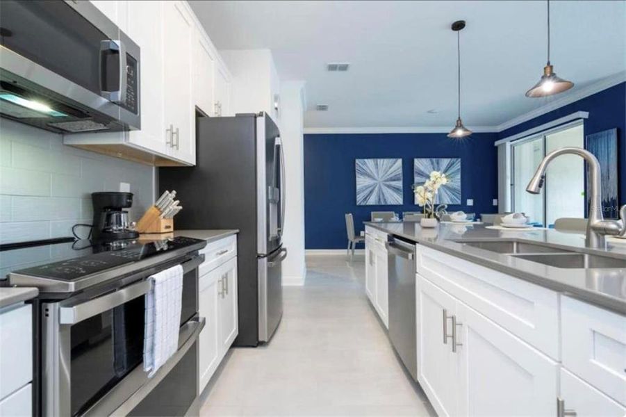 Furnished interior view inside a new home in , Kissimmee (Image 15). Furnished interior view inside a new home in , Kissimmee (Image 15).