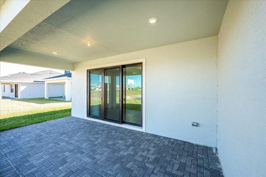 This new single-story home provides ease-of-living with ample room to grow. Down the foyer is a shared open-concept layout situated between the kitchen, dining room and Great Room, with glass-sliders leading out to the covered lanai. On the opposite side of the home are three secondary bedrooms and a privately situated owner’s suite with an adjoining bathroom. A versatile two-car garage provides storage room. Prices, dimensions and features may vary and are subject to change. Photos are for illustrative purposes only. This new single-story home provides ease-of-living with ample room to grow. Down the foyer is a shared open-concept layout situated between the kitchen, dining room and Great Room, with glass-sliders leading out to the covered lanai. On the opposite side of the home are three secondary bedrooms and a privately situated owner’s suite with an adjoining bathroom. A versatile two-car garage provides storage room. Prices, dimensions and features may vary and are subject to change. Photos are for illustrative purposes only.