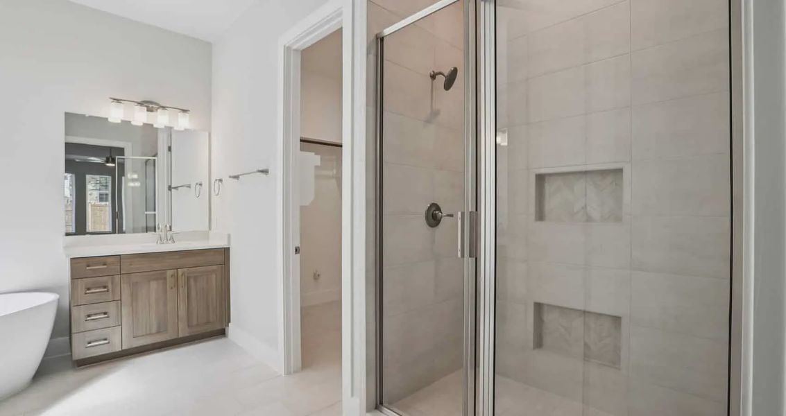 Furnished interior view inside a new home in 6 Creeks, Kyle (Image 9).