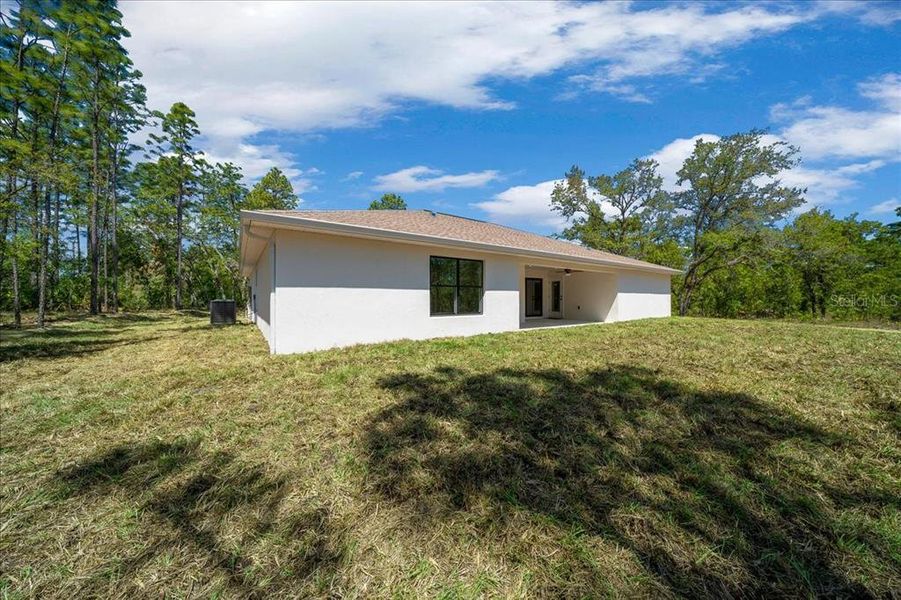 Exterior details and patio area of a home in , Ocala (Image 32).