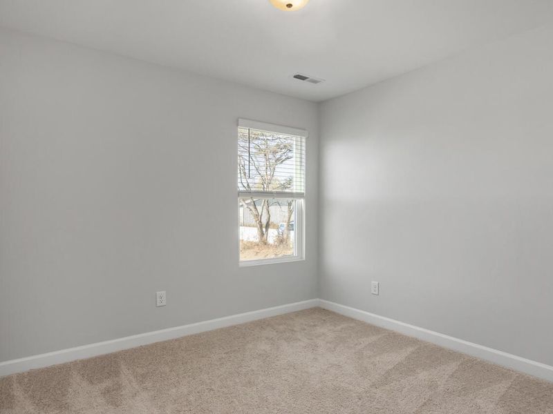 Spacious, unfurnished interior of a new home in Gregory Village, Lillington (Image 24).