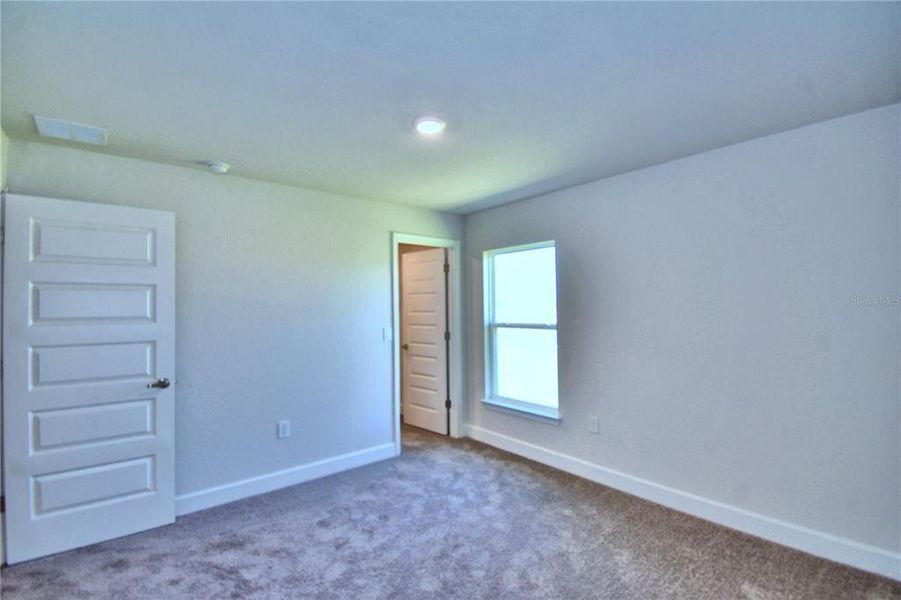 Spacious, unfurnished interior of a new home in Cadence Crossing, Auburndale (Image 23).