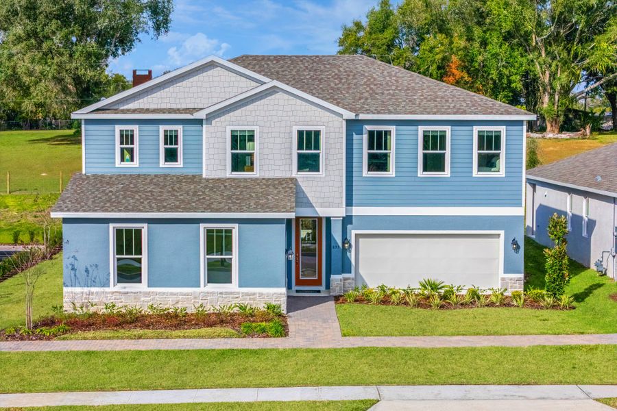 Representative exterior photo of a completed home built from the Paxton by Hartizen Homes in Eden Crest Single Family Homes, Apopka, FL (Image 28).