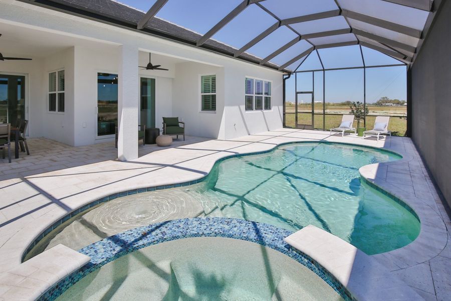 Exterior details and patio area of a home in Palm Grove, Lakewood Ranch (Image 24).