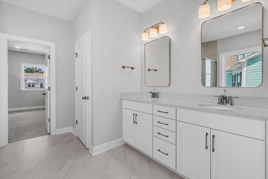 Furnished interior view inside a new home in Tidewater at Lakes of Cane Bay, Summerville (Image 10).