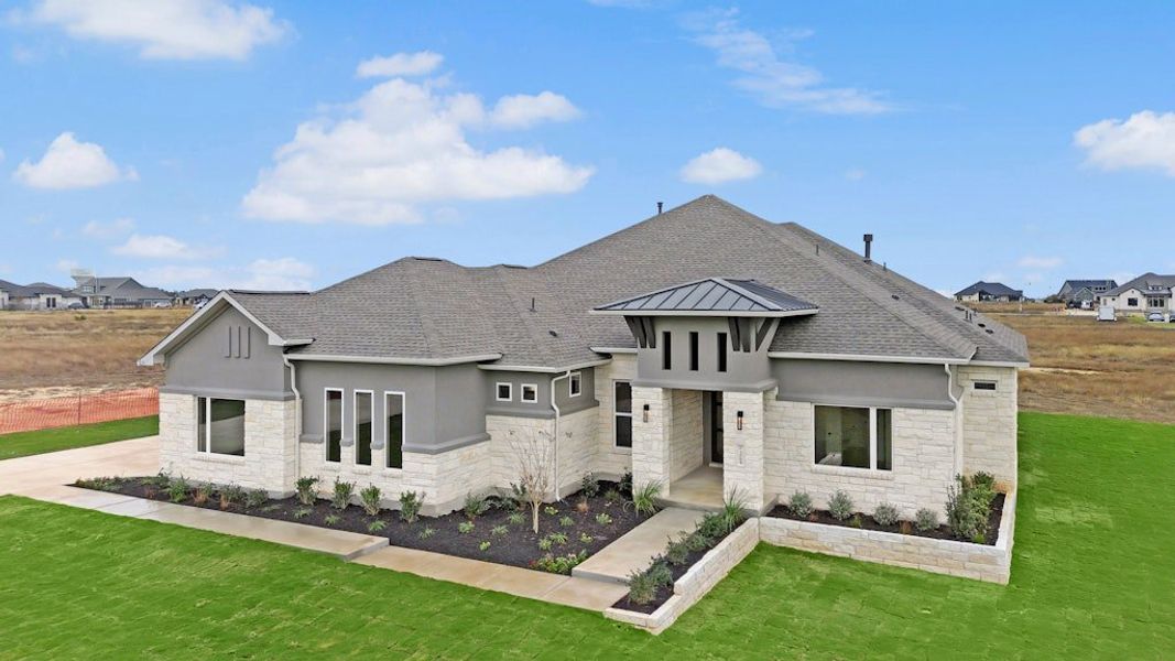 Front exterior of a new home in Leander Estates, Leander, TX, highlighting curb appeal (Image 19). Front exterior of a new home in Leander Estates, Leander, TX, highlighting curb appeal (Image 19).