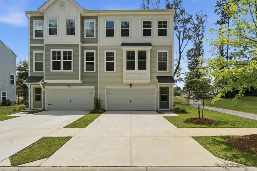 Front exterior of a new home in , Hanahan, SC, highlighting curb appeal (Image 24).