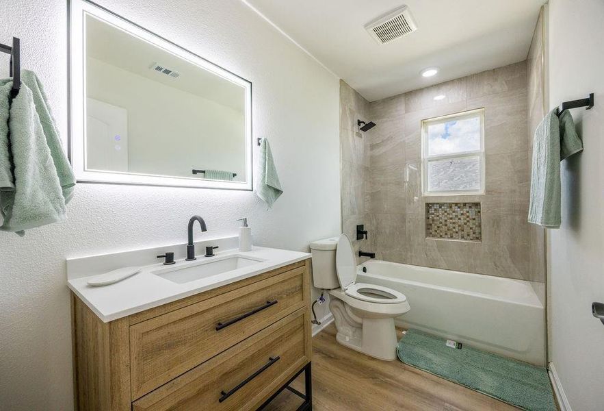 Furnished interior view inside a new home in , Woodway (Image 8).