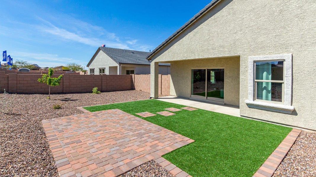 Front exterior of a new home in Saguaro Bloom, Marana, AZ, highlighting curb appeal (Image 22). Front exterior of a new home in Saguaro Bloom, Marana, AZ, highlighting curb appeal (Image 22).