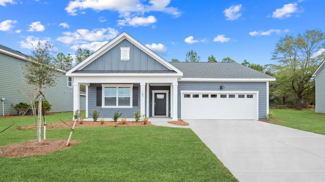 Front exterior of a new home in The Lakes at North Glynn, Brunswick, GA, highlighting curb appeal (Image 1). Front exterior of a new home in The Lakes at North Glynn, Brunswick, GA, highlighting curb appeal (Image 1).