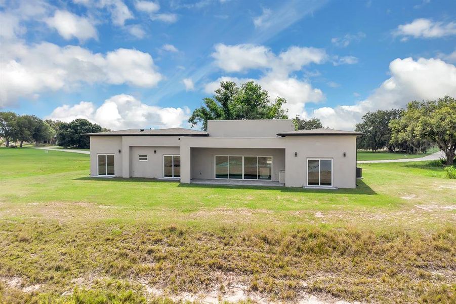 Front exterior of a new home in , Sebring, FL, highlighting curb appeal (Image 1).