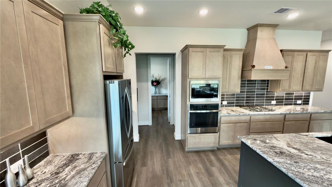 From the dining area you can enter into the coffee bar, walk in pantry and pocket office