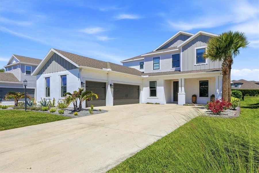 Front exterior of a new home in , Sarasota, FL, highlighting curb appeal (Image 22).