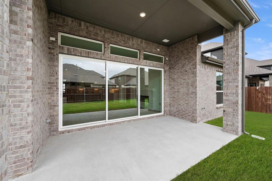Exterior details and patio area of a home in High Country, Burleson (Image 22).